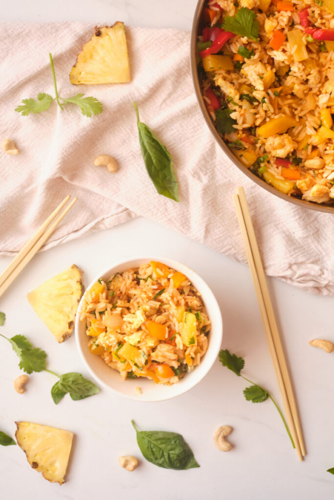 A birdseye view of thai pineapple fried rice with basil