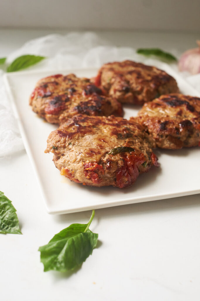 turkey burger patties freshly made on a plate