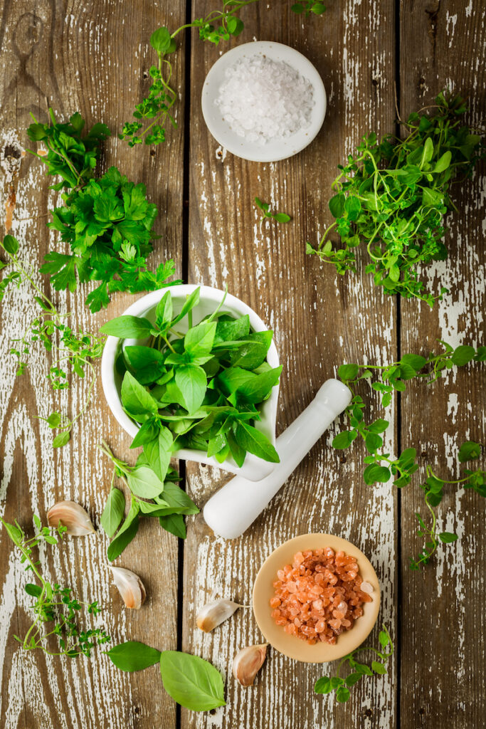 Thai basil, rosemary and other herbs with Himalayan salt