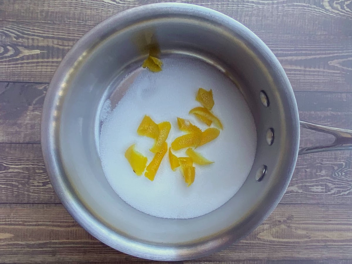 Sugar and lemon peel in a saucepan
